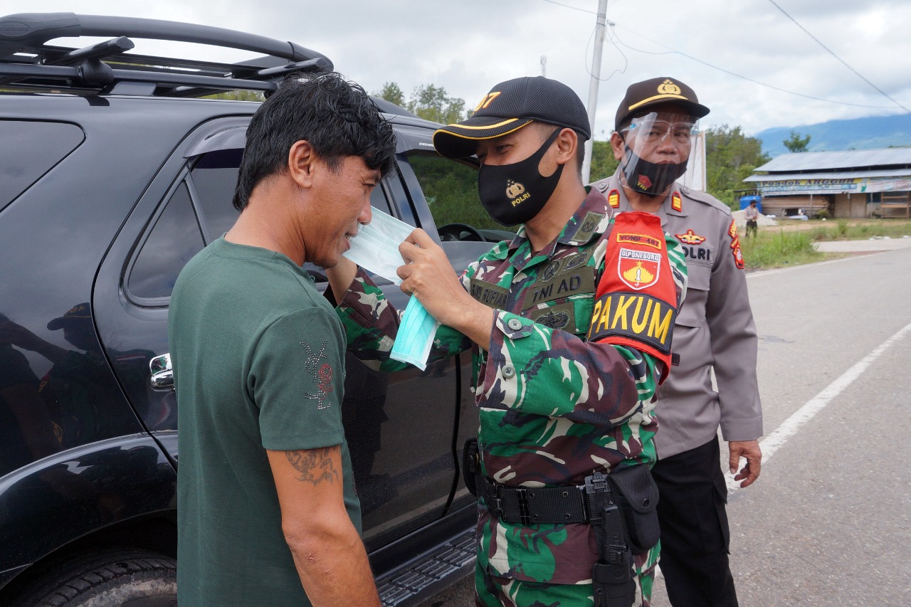 Satgas 407 Disiplinkan Masyarakat Perbatasan, Patuhi Protokol Kesehatan