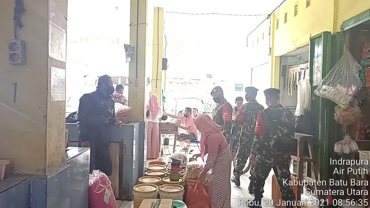 Lakukan Pengamanan Disiplin Covid-19 Personel Jajaran Kodim 0208/Asahan Di Pajak Deli Indrapura