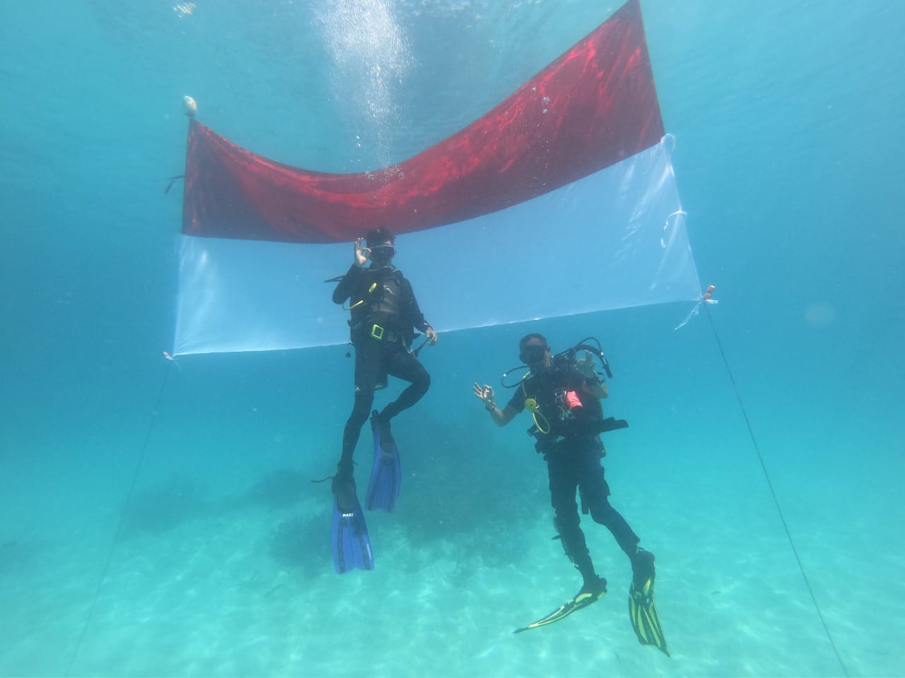 Sang Merah Putih Berkibar di Dasar Laut Perbatasan NKRI