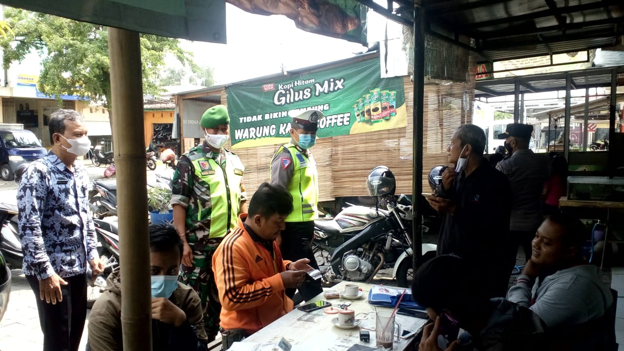 Cegah Penyebaran Covid-19, Tiga Pilar Kecamatan Manguharjo Gelar Operasi Yustisi