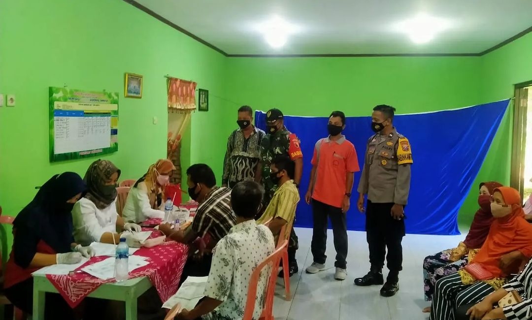 Koramil 0801/01 Pacitan Terus Menerus Pantau Vaksinasi Masyarakat Di Wilayahnya